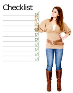 Woman ticking on a checklist