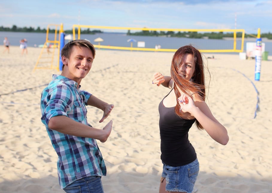 young people having fun on the beach