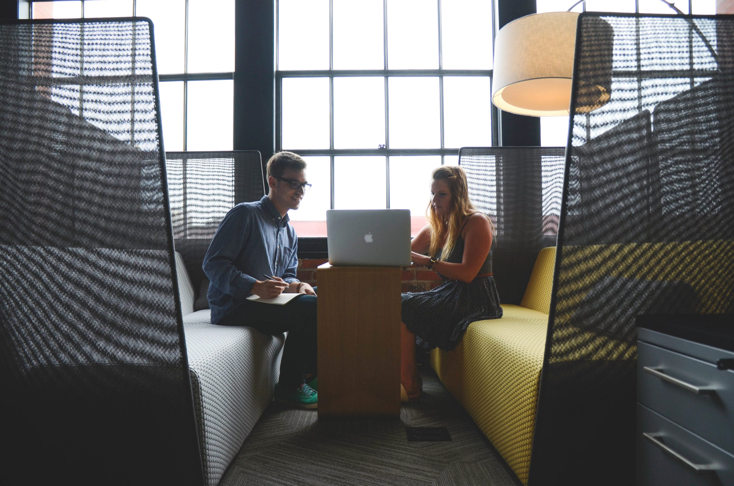 man and woman working together